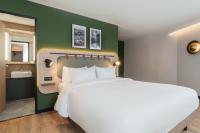 Campanile Prime Paris 19 - La Villetteにあるベッド