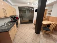 A kitchen or kitchenette at Apart Albore