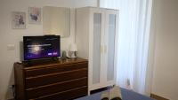 A television and/or entertainment centre at NEW! True-stevere Amazing Double Bed for 5 pax