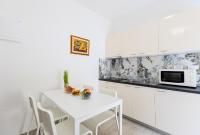 Kuchyň nebo kuchyňský kout v ubytování Apartments Lorena