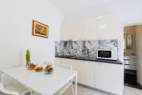 Kuchyň nebo kuchyňský kout v ubytování Apartments Lorena
