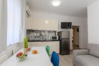 Kuchyň nebo kuchyňský kout v ubytování Apartments Lorena