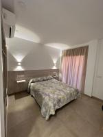 Postel nebo postele na pokoji v ubytování RAQUEL'S - Habitacions i Apartaments turístics -