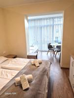 Postel nebo postele na pokoji v ubytování Lazur Apartamenty