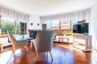 Televízia a/alebo spoločenská miestnosť v ubytovaní Villa Monbijou