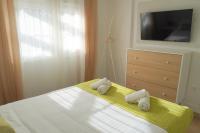 Postel nebo postele na pokoji v ubytování Villa MyRuedo