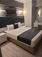Postel nebo postele na pokoji v ubytování Yilmazel Hotel