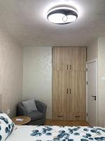 Postel nebo postele na pokoji v ubytování Апартамент Easy Lux