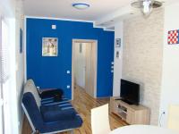 TV a/nebo společenská místnost v ubytování Apartments Pinus