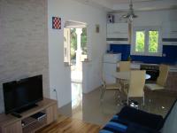 Kuchyň nebo kuchyňský kout v ubytování Apartments Pinus