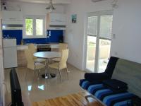 Kuchyň nebo kuchyňský kout v ubytování Apartments Pinus
