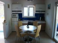 Kuchyň nebo kuchyňský kout v ubytování Apartments Pinus