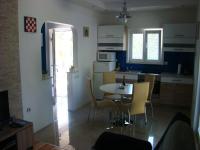 Kuchyň nebo kuchyňský kout v ubytování Apartments Pinus