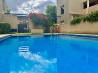 Bazén v ubytovaní GATU El Arrecife - Apartamento a 2 minutos de la playa en El Puerto de Santamaría , Preferente mayores de 25 años y familias alebo v jeho blízkosti