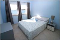 Posteľ alebo postele v izbe v ubytovaní Apartments Villa J i M by the sea