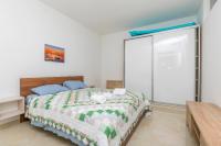 Posteľ alebo postele v izbe v ubytovaní Apartments Villa J i M by the sea