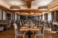 Reštaurácia alebo iné gastronomické zariadenie v ubytovaní Ravelli Sporting