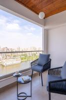 Posezení v ubytování Brassbell l Zamalek l Om Kolthoom l Nile View