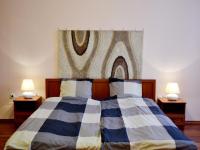 A bed or beds in a room at Gabriel Apartment