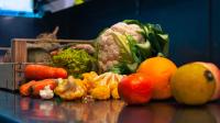 a bunch of fruits and vegetables on a table at Hotel la Turra in Termignon