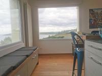 Kuchyňa alebo kuchynka v ubytovaní Rhun Izella - Maison avec vue exceptionnelle - Jacuzzi et Sauna face à la mer