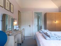 Postel nebo postele na pokoji v ubytování Wildwood B&B