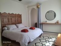Postel nebo postele na pokoji v ubytování Kemet House