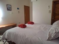 Postel nebo postele na pokoji v ubytování Kemet House
