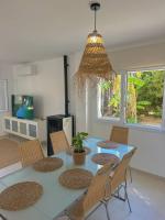 A television and/or entertainment centre at Bonaire Beach House