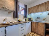 Kuchyňa alebo kuchynka v ubytovaní Holiday Home Palma by Interhome