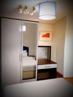 A bed or beds in a room at Mimoza İstiklal Apart Hotel
