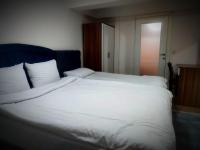 A bed or beds in a room at Mimoza İstiklal Apart Hotel