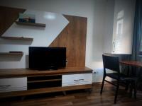 A television and/or entertainment centre at Mimoza İstiklal Apart Hotel