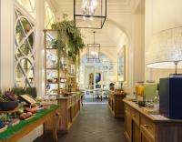 a large kitchen with wooden counters and a large archway at Only YOU Boutique Hotel Madrid in Madrid