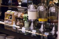 a counter in a store with two large glass jars at Just Enjoy Business Hotel in Tainan