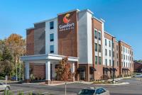 a building with a sign that reads comfort inn suites at Comfort Inn &amp; Suites Downtown near University in Tuscaloosa