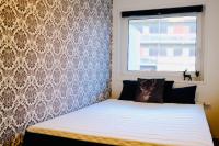 Postel nebo postele na pokoji v ubytování Aurora Skyline Stay