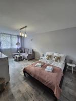 Posteľ alebo postele v izbe v ubytovaní Górski Apartament