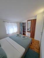 Łóżko lub łóżka w pokoju w obiekcie Sweet Home Lustig