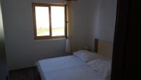 Posteľ alebo postele v izbe v ubytovaní Apartment Marijica