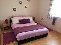 Posteľ alebo postele v izbe v ubytovaní Apartments Durda