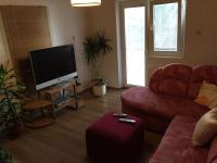 Televízia a/alebo spoločenská miestnosť v ubytovaní Apartments Durda