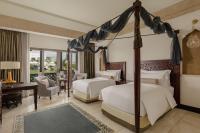 Sharq Village & Spa, a Ritz-Carlton Hotelにあるベッド