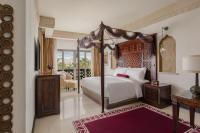 Sharq Village & Spa, a Ritz-Carlton Hotelにあるベッド