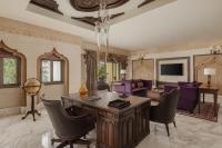 Sharq Village & Spa, a Ritz-Carlton Hotelにあるテレビまたはエンターテインメントセンター