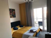 Posteľ alebo postele v izbe v ubytovaní Apartment