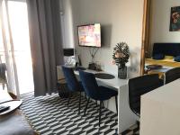 Televízia a/alebo spoločenská miestnosť v ubytovaní Apartment