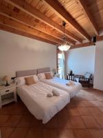 Posteľ alebo postele v izbe v ubytovaní Sitjar Casa Rural