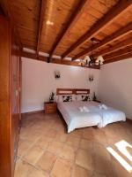 Posteľ alebo postele v izbe v ubytovaní Sitjar Casa Rural