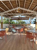 Un restaurante u otro lugar para comer en Reside Siargao